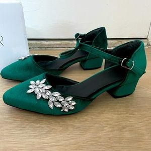 Emerald green pumps